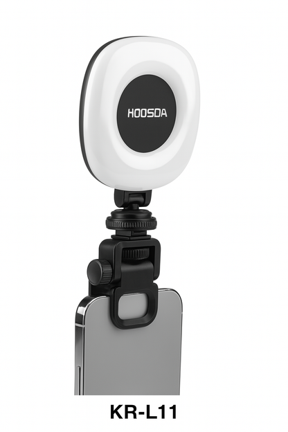 Lumière selfie KOOSDA KR-L11 posée sur un smartphone – Éclairage LED rotatif pour vidéos et photos